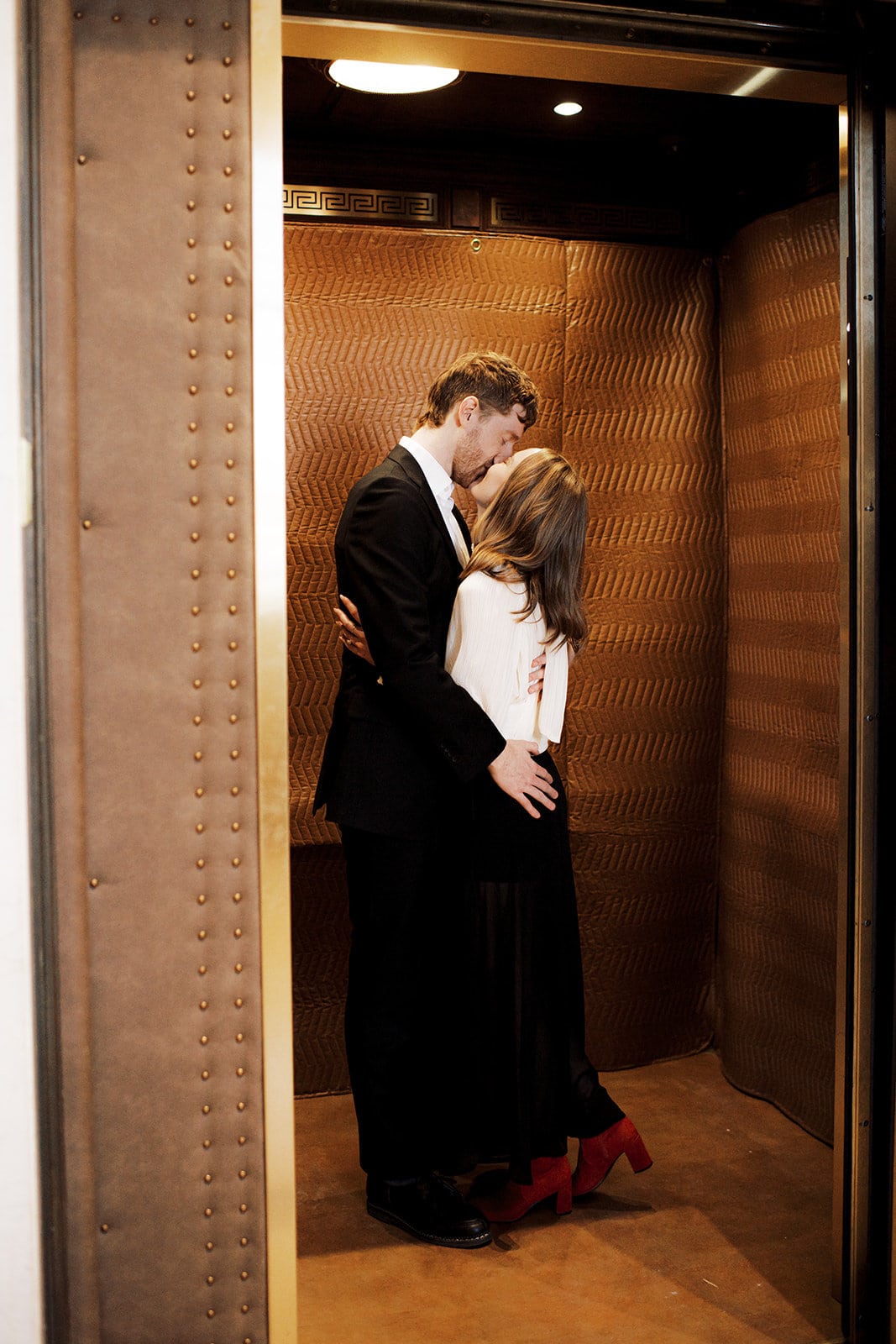 edgy Washington DC engagement photos at national portrait gallery engagement session romance in an elevator L Hewitt Photography
